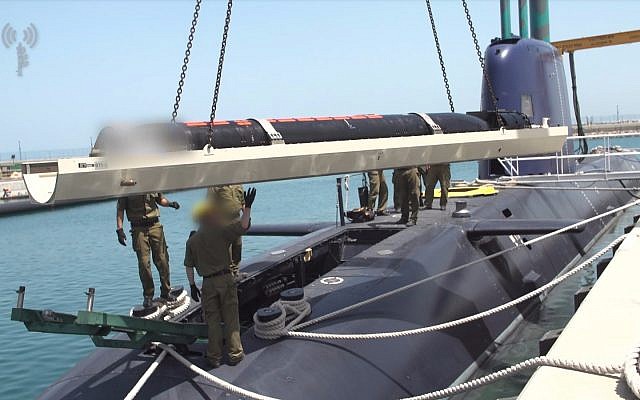 A June 19, 2018 photo of an Israeli Navy submarine being outfitted with a smart new torpedo system. (IDF Spokesperson's Unit)
