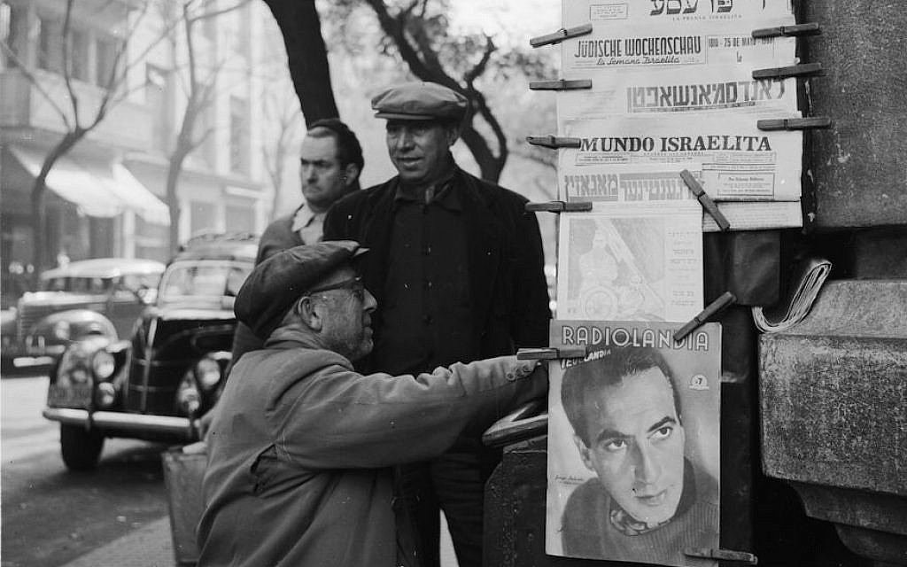 A man buying Jewish newspapers from a stall in Buenos Aires, circa 1956. (Evans/Three Lions/Getty Images) A man buying Jewish newspapers from a stall in Buenos Aires, circa 1956. (Evans/Three Lions/Getty Images)