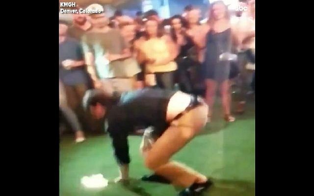 Off-duty FBI agent accidentally shoots bystander, after his gun falls out of holster while he was doing a backflip on June 2, 2018. (Screen capture: Twitter) Off-duty FBI agent accidentally shoots bystander, after his gun falls out of holster while he was doing a backflip on June 2, 2018. (Screen capture: Twitter)