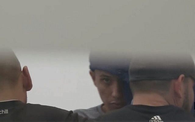 Fahdi Malouk at the Tel Aviv Magistrate's court in May 2018. (Channel 10 screenshot) Fahdi Malouk at the Tel Aviv Magistrate's court in May 2018. (Channel 10 screenshot)