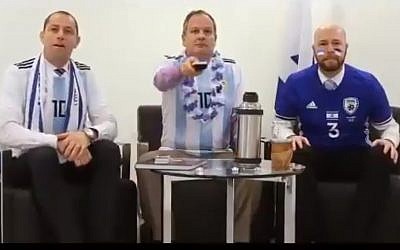 Israeli ambassador to Argentina, Ilan Sztulman, (C) and friends get ready to root for Lionel Messi's team in a humorous video clip  made for the World Cup opening on June 14, 2018