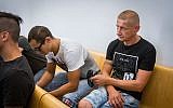 Andrei Case (R) and Peter Guskov (L) former employees of a nursing home in Haifa who were sentenced for abusing the elderly at a nursing home, seen at the Haifa District Court on June 7, 2018. (Flash90)
