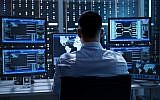 'Israel's Technology Economy, Origins and Impact' by David Rosenberg takes a hard look at Israel's startup industry and its impact -- good and bad, on the nation's economy; Illustrative image of a system security specialist at work (gorodenkoff; iStock by Getty Images)