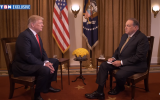 Former Arkansas governor Mike Huckabee, right, interviews US President Donald Trump at the White House on June 18, 2018. (YouTube screen capture)