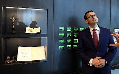 Prime Minister Mateusz Morawiecki of Poland visits the Ulma Family Museum, Jan. 2, 2018. Right-wing critics in his country accused Morawiecki of capitulating to Israel in softening a law on Holocaust rhetoric. (Janek Skarzynski/AFP/Getty Images via JTA)