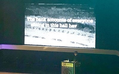 Prime Minister Benjamin Netanyahu stages a cyber attack at a cybersecurity conference in Tel Aviv, June 20, 2018 (Shoshanna Solomon / Times of Israel)
