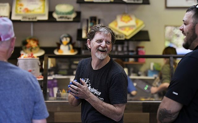 Jack Phillips, owner of the Masterpiece Cakeshop, celebrates in his Colorado store after the US Supreme Court voted 7-2 in his favor in a dispute with a gay couple, June 4, 2018. (Joe Amon/The Denver Post via Getty Images, JTA) Jack Phillips, owner of the Masterpiece Cakeshop, celebrates in his Colorado store after the US Supreme Court voted 7-2 in his favor in a dispute with a gay couple, June 4, 2018. (Joe Amon/The Denver Post via Getty Images, JTA)