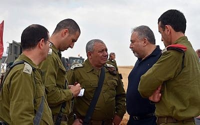 Illustrative: Then-Defense Minister Avigdor Liberman, center-right, meets with senior officers in the IDF Southern Command, including IDF chief Gadi Eisenkot, center, and Maj. Gen. Herzl Halevi, right, on June 12, 2018. (Ariel Hermoni/Defense Ministry)