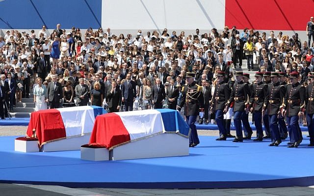 French Republican Guards arrive to carry the coffins of former French politician and Holocaust survivor Simone Veil and her husband Antoine Veil to the Pantheon in Paris on July 1, 2018 during the burial ceremony. (AFP Photo/Pool/Ludovic Marin) French Republican Guards arrive to carry the coffins of former French politician and Holocaust survivor Simone Veil and her husband Antoine Veil to the Pantheon in Paris on July 1, 2018 during the burial ceremony. (AFP Photo/Pool/Ludovic Marin)