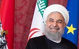 Iranian President Hassan Rouhani listens during a joint press conference with Austrian President following talks on July 4, 2018 at the Hofburg Palace in Vienna. (AFP PHOTO / APA / GEORG HOCHMUTH)