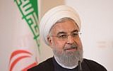 Iranian President Hassan Rouhani speaks during a joint press conference with Austria's Chancellor Sebastian Kurz following a meeting on July 4, 2018, at the Chancellery in Vienna. (AFP Photo/Alex Halada)