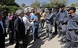 European General Consuls of France (L), Sweden, Belgium, Italy, Ireland, Switzerland, Findand, Denmark and European Union are blocked by Israeli police as they try to visit the Bedouin village of Khan al-Ahmar, in the West Bank east of Jerusalem on July 5, 2018. (AFP PHOTO / THOMAS COEX)