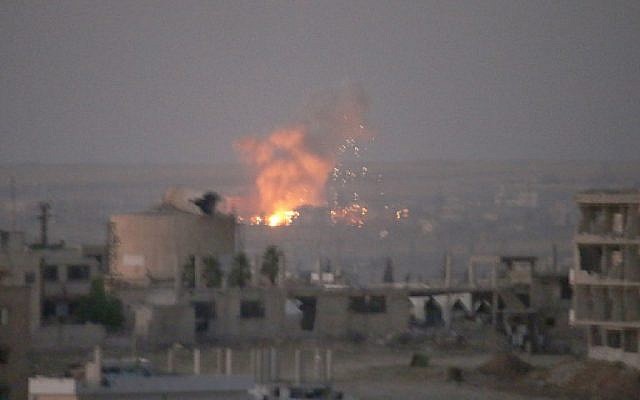 This picture shows an explosion in rebel-held areas of the city of Daraa during reported airstrikes by Syrian regime forces on July 5, 2018. (AFP/Mohamad Abazeed) This picture shows an explosion in rebel-held areas of the city of Daraa during reported airstrikes by Syrian regime forces on July 5, 2018. (AFP/Mohamad Abazeed)