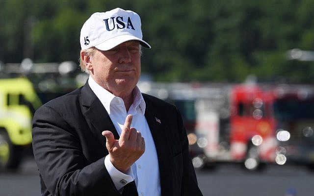 US President Donald Trump confers with the media upon arrival at Morristown Municipal Airport in Morristown, New Jersey, July 8, 2018 prior to boarding Air Force One following a weekend in Bedminster, New Jersey. (AFP PHOTO / JIM WATSON) US President Donald Trump confers with the media upon arrival at Morristown Municipal Airport in Morristown, New Jersey, July 8, 2018 prior to boarding Air Force One following a weekend in Bedminster, New Jersey. (AFP PHOTO / JIM WATSON)