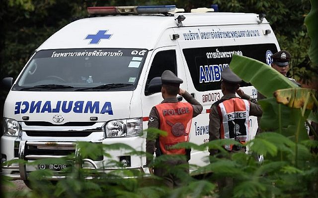 An ambulance exits from the Tham Luang cave area as operations continue for the 8 boys and their coach trapped at the cave in Khun Nam Nang Non Forest Park in the Mae Sai district of Chiang Rai province on July 9, 2018. (AFP PHOTO / YE AUNG THU) An ambulance exits from the Tham Luang cave area as operations continue for the 8 boys and their coach trapped at the cave in Khun Nam Nang Non Forest Park in the Mae Sai district of Chiang Rai province on July 9, 2018. (AFP PHOTO / YE AUNG THU)