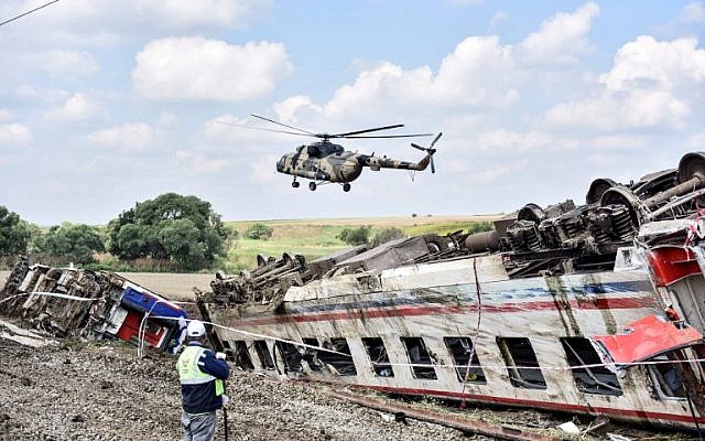 A helicopter flies over the site where a train derailed at Corlu district in Tekirdag, northwest Turkey, on July 9, 2018. (AFP PHOTO / DHA) A helicopter flies over the site where a train derailed at Corlu district in Tekirdag, northwest Turkey, on July 9, 2018. (AFP PHOTO / DHA)