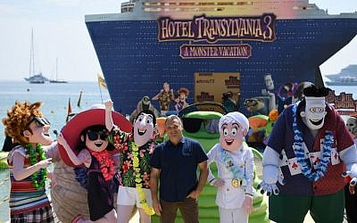 Russian-US director Genndy Tartakovsky (C) poses during a photocall for the animated film "Hotel Transylvania 3 : A Monster Vacation" on the eve of the opening of the 71st edition of the Cannes Film Festival in Cannes, southern France, May 7, 2018 (AFP PHOTO / LOIC VENANCE)