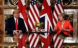 US President Donald Trump listens to Britain's Prime Minister Theresa May prior to a meeting at Chequers, the prime minister's country residence, near Ellesborough, northwest of London on July 13, 2018 on the second day of Trump's UK visit. (AFP/Brendan Smialowski)