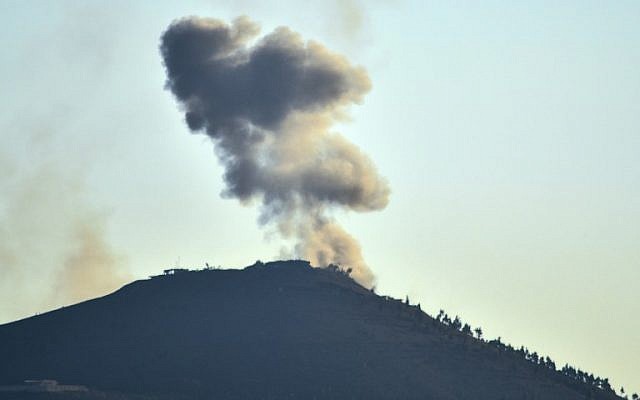 A picture taken on July 16, 2018 shows a smoke plume rising along the horizon near the Syrian city of al-Harra in Daraa province from reported Syrian and Russian air strikes. (AFP Photo/Moaz Al-Asaad) A picture taken on July 16, 2018 shows a smoke plume rising along the horizon near the Syrian city of al-Harra in Daraa province from reported Syrian and Russian air strikes. (AFP Photo/Moaz Al-Asaad)