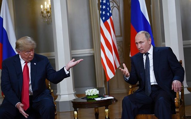 Russian President Vladimir Putin (R) and US President Donald Trump pose ahead a meeting in Helsinki, on July 16, 2018. (AFP Photo/Brendan Smialowski) Russian President Vladimir Putin (R) and US President Donald Trump pose ahead a meeting in Helsinki, on July 16, 2018. (AFP Photo/Brendan Smialowski)