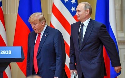 US President Donald Trump (L) and Russia's President Vladimir Putin arrive to attend a joint press conference after a meeting at the Presidential Palace in Helsinki, on July 16, 2018. (AFP Photo/Yuri Kadobnov) US President Donald Trump (L) and Russia's President Vladimir Putin arrive to attend a joint press conference after a meeting at the Presidential Palace in Helsinki, on July 16, 2018. (AFP Photo/Yuri Kadobnov)