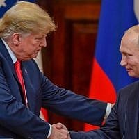 US President Donald Trump (L) and Russia's President Vladimir Putin shake hands before attending a joint press conference after a meeting at the Presidential Palace in Helsinki, on July 16, 2018. (AFP Photo/Yuri Kadobnov)