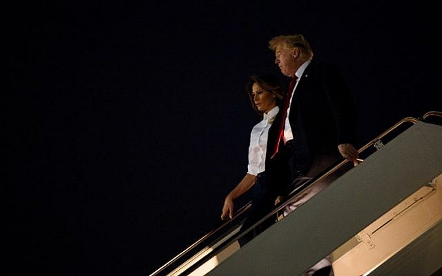 US President Donald Trump and First Lady Melania Trump arrive at Andrews Air Force Base in Maryland on July 16, 2018. (AFP Photo/Brendan Smialowski) US President Donald Trump and First Lady Melania Trump arrive at Andrews Air Force Base in Maryland on July 16, 2018. (AFP Photo/Brendan Smialowski)