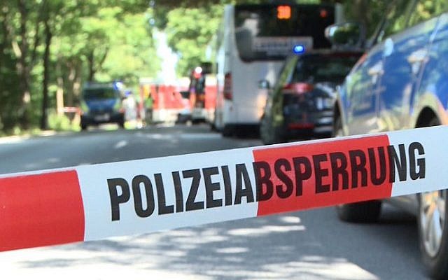 A police ribbon cordons off a street where a public service bus stands in Kuecknitz near Luebeck northern Germany, after several people were injured in the bus in an assault by a man wielding a knife on July 20, 2018. (AFP/dpa) A police ribbon cordons off a street where a public service bus stands in Kuecknitz near Luebeck northern Germany, after several people were injured in the bus in an assault by a man wielding a knife on July 20, 2018. (AFP/dpa)
