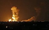 Illustrative image of explosions from Israeli bombardment in Khan Younis in the southern Gaza Strip on July 20, 2018. (AFP Photo/Said Khatib)