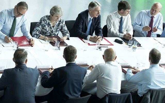 Britain's Prime Minister Theresa May (2L) chairs a meeting of her cabinet at Sage Gateshead, in Gateshead, northeast England, on July 23, 2018. (AFP Photo/Pool/Danny Lawson) Britain's Prime Minister Theresa May (2L) chairs a meeting of her cabinet at Sage Gateshead, in Gateshead, northeast England, on July 23, 2018. (AFP Photo/Pool/Danny Lawson)
