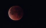 The 'super blue blood moon' is seen over Los Angeles, California, January 31, 2018.  (AFP Photo/Robyn Beck)