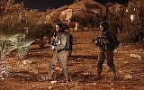 A picture taken on July 26, 2018 shows Israeli security forces at the Adam settlement. (AFP  / Ahmad GHARABLI)