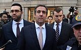 In this photo taken on April 26, 2018, US President Donald Trump's former personal lawyer Michael Cohen (C) leaves the US Courthouse in New York. (AFP Photo/Hector Retamal)