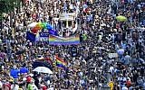 Participants of the Christopher Street Day gay pride parade walk through the streets of Berlin on July 28, 2018. (Tobias SCHWARZ/AFP)