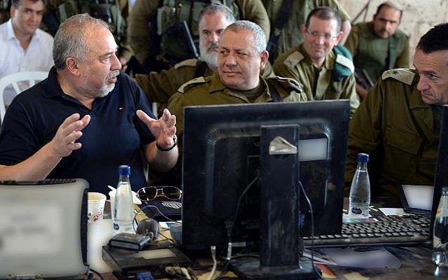 Defense Minister Avigdor Liberman, left, speaks with IDF Chief of Staff Gadi Eisenkot, center, and head of the IDF Southern Command Maj. Gen. Herzl Halevi, right, during an exercise simulating warfare in the Gaza Strip on July 17, 2018. (Ariel Hermoni/Defense Ministry) Defense Minister Avigdor Liberman, left, speaks with IDF Chief of Staff Gadi Eisenkot, center, and head of the IDF Southern Command Maj. Gen. Herzl Halevi, right, during an exercise simulating warfare in the Gaza Strip on July 17, 2018. (Ariel Hermoni/Defense Ministry)