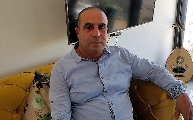 Ramadan Dabash, a Palestinian resident of Sur Baher running for Jerusalem's city council, at his second home in Beit Hanina, July 2018 (Adam Rasgon/Times of Israel) Ramadan Dabash, a Palestinian resident of Sur Baher running for Jerusalem's city council, at his second home in Beit Hanina, July 2018 (Adam Rasgon/Times of Israel)