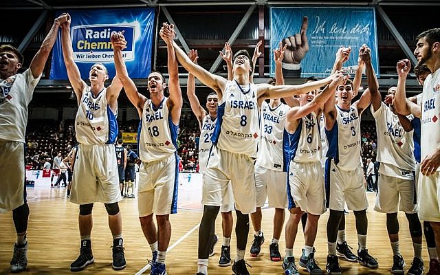 Israel's national under-20 basketball team reacts to winning the FIBA European Championships for the first time on July 22, 2018. (Israel Basketball Association, courtesy) Israel's national under-20 basketball team reacts to winning the FIBA European Championships for the first time on July 22, 2018. (Israel Basketball Association, courtesy)