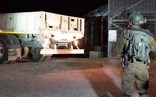 Israeli troops prepare to deliver tons of food and other humanitarian aid to southern Syria in July 2018. (Israel Defense Forces) Israeli troops prepare to deliver tons of food and other humanitarian aid to southern Syria in July 2018. (Israel Defense Forces)