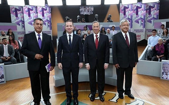 In this May 20, 2018 file photo released by Mexico's National Electoral Institute, INE, presidential candidates, from left, independent Jaime Rodriguez, known as "El Bronco," Ricardo Anaya of the Forward for Mexico Coalition, Jose Antonio Meade, of the Institutional Revolutionary Party, and Andres Manuel Lopez Obrador, with the MORENA party, attend the second of three debates in Tijuana, Mexico. (INE via AP, File) In this May 20, 2018 file photo released by Mexico's National Electoral Institute, INE, presidential candidates, from left, independent Jaime Rodriguez, known as "El Bronco," Ricardo Anaya of the Forward for Mexico Coalition, Jose Antonio Meade, of the Institutional Revolutionary Party, and Andres Manuel Lopez Obrador, with the MORENA party, attend the second of three debates in Tijuana, Mexico. (INE via AP, File)