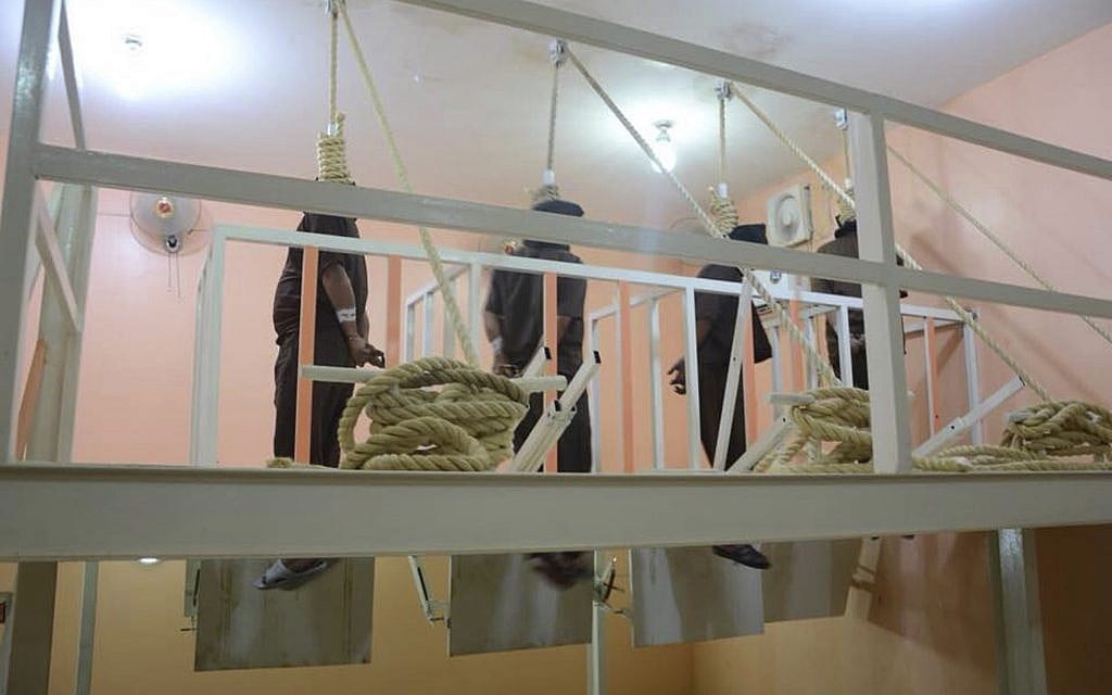 This photo released by Iraq's Ministry of Justice June 29, 2018, shows four men hanging in the gallows in Iraq. (Iraq Ministry of Justice via AP) This photo released by Iraq's Ministry of Justice June 29, 2018, shows four men hanging in the gallows in Iraq. (Iraq Ministry of Justice via AP)