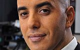 Notorious French criminal Redoine Faid poses prior to an interview with French all-news TV channel, LCI, as he was promoting his book, in Boulogne-Billancourt, outside Paris, France, November 22, 2010. (IBO/Sipa via AP)