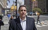 In this file photo from April 11, 2018, attorney Michael Cohen walks down the sidewalk in New York. (AP Photo/Seth Wenig, File)