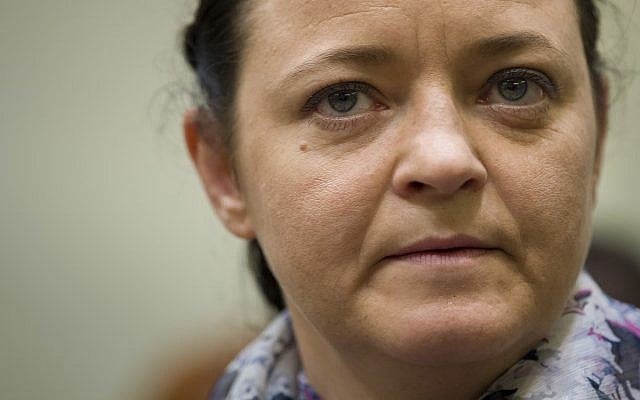 Terror suspect Beate Zschaepe stands in the court room in Munich, Germany, on July 3, 2018. (Peter Kneffel/dpa via AP, Pool) Terror suspect Beate Zschaepe stands in the court room in Munich, Germany, on July 3, 2018. (Peter Kneffel/dpa via AP, Pool)
