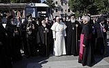 Pope Francis arrives to host a daylong prayer for peace in the Middle East with an unprecedented gathering of Orthodox patriarchs and Catholic leaders in Bari, southern Italy, Saturday, July 7, 2018 (AP Photo/Alessandra Tarantino)