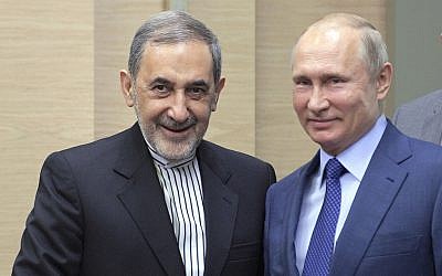 Russian President Vladimir Putin, right, with Ali Akbar Velayati, a senior adviser to Iran's Supreme Leader Ayatollah Ali Khamenei, at Novo-Ograyovo, Moscow, Russia, July 12, 2018. (Alexei Druzhinin, Sputnik, Kremlin Pool Photo via AP)