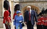 US President Donald Trump (r) with Queen Elizabeth II, inspecting the Guard of Honour at Windsor Castle in Windsor, England, July 13, 2018. (AP Photo/Pablo Martinez Monsivais)