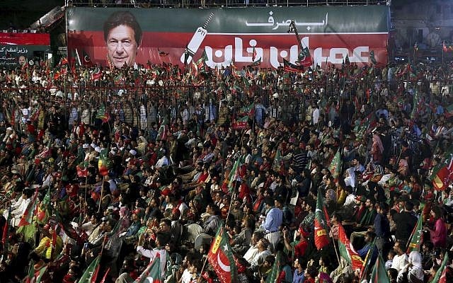 Supporters of Pakistani politician Imran Khan attend his election rally in Karachi, Pakistan, July 22, 2018. (AP Photo/Shakil Adil, File) Supporters of Pakistani politician Imran Khan attend his election rally in Karachi, Pakistan, July 22, 2018. (AP Photo/Shakil Adil, File)