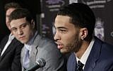 Tyler Honeycutt, the Sacramento Kings second round pick, 35th overall, in Thursday's NBA draft, responds to a question as Jimmer Fredette, left, the Kings first round pick, 10th, overall looks on during a news conference in Sacramento, California, June 25, 2011.  (AP Photo/Rich Pedroncelli)