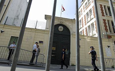 Illustrative: French police officers stand guard outside the Iranian embassy in Paris Tuesday, May 29, 2012. (AP Photo/Jacques Brinon)
