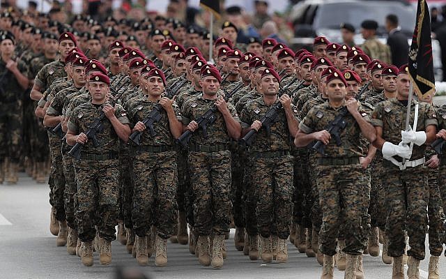 File photo of Lebanese army special forces marching during a military parade to mark the 74th anniversary of Lebanon's independence from France in downtown Beirut, Lebanon, November 22, 2017. (AP Photo/Hussein Malla) File photo of Lebanese army special forces marching during a military parade to mark the 74th anniversary of Lebanon's independence from France in downtown Beirut, Lebanon, November 22, 2017. (AP Photo/Hussein Malla)